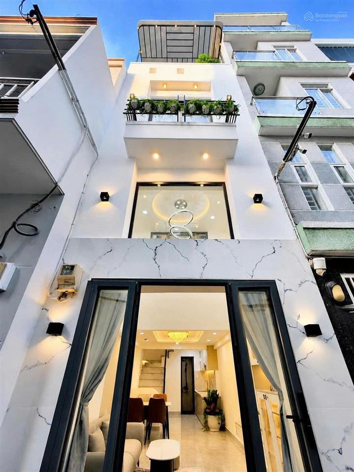 Hẻm xe hơi đến cửa nguyễn kiệm phú nhuận  4 tầng dtsd 100m2 3pn 4wc