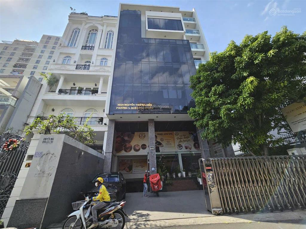 Bán tòa nhà văn phòng ngay phan đăng lưu  hầm + 8 tầng  dt 12 x 25m (300m2)  giá 148 tỷ