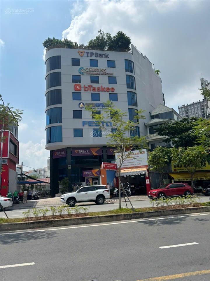 Hạ giá bán nhà mặt tiền nơ trang long, quận bình thạnh  dt 10x23m  hầm 7 tầng  giá 41 tỷ