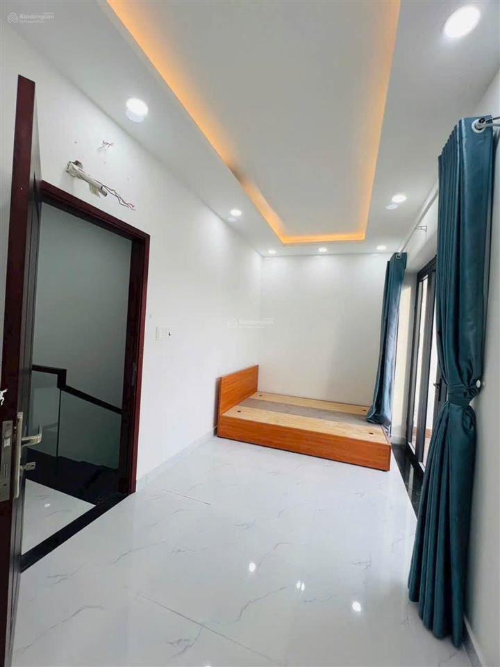 Nhà 1 trệt 2 lầu quận 9  đường oto