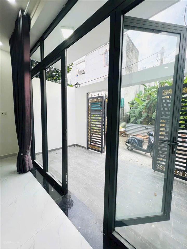 Nhà 1 trệt 2 lầu quận 9  đường oto