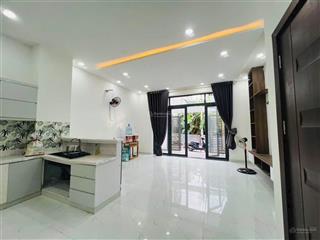 Nhà 1 trệt 2 lầu quận 9  đường oto
