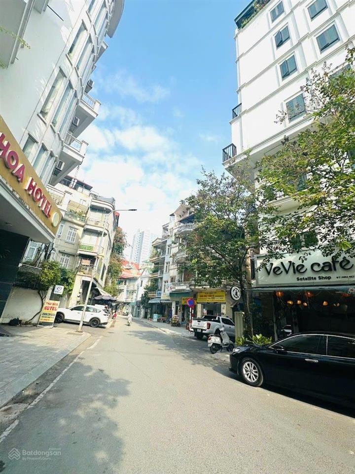 Bán nhà mặt ngõ 603 lạc long quân  8 tầng thang máy  48m  kinh doanh, đường 3 ô tô tránh vỉa hè