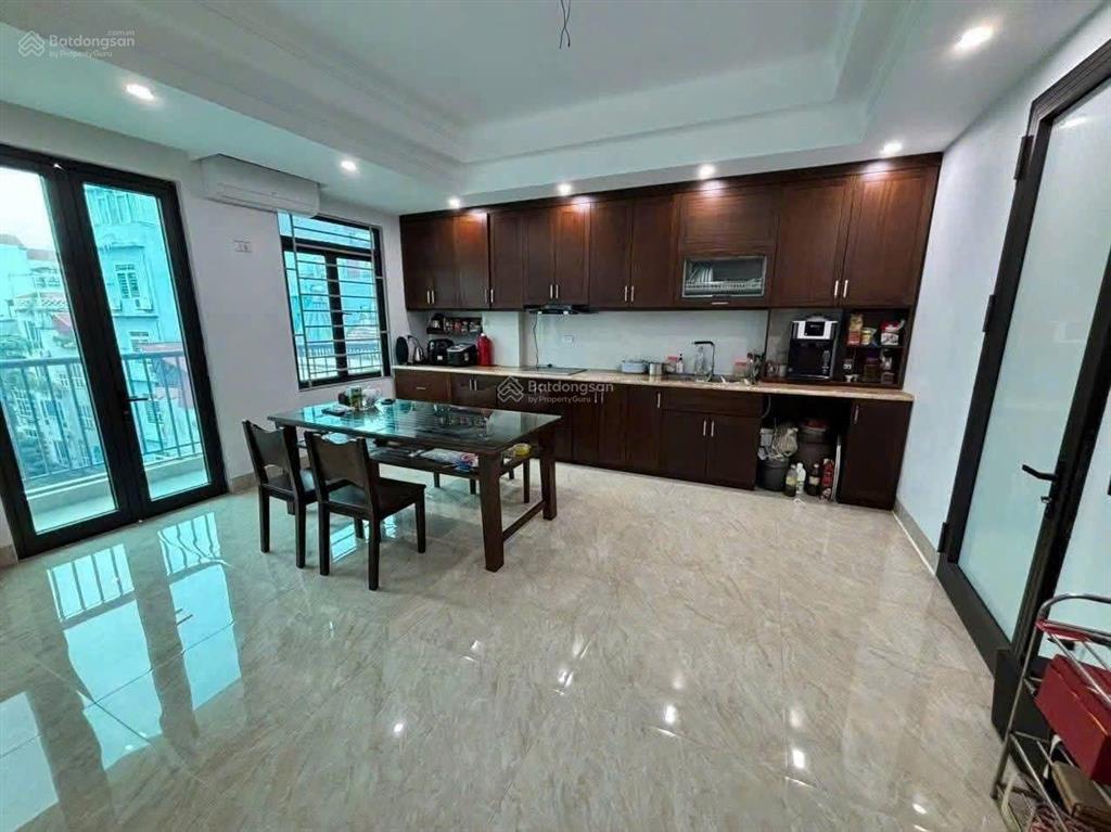 Bán nhà mặt ngõ 603 lạc long quân  8 tầng thang máy  48m  kinh doanh, đường 3 ô tô tránh vỉa hè