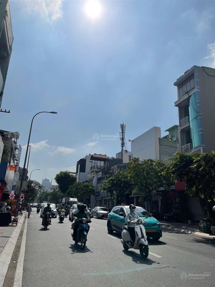 Bán toà nhà mặt tiền đinh tiên hoàng, quận 1. dt 6,8mx20m. 5 tầng.