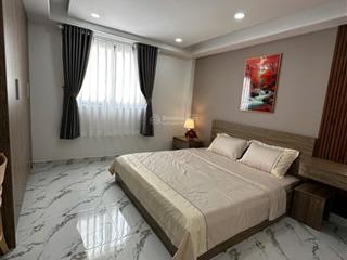 Bán nhà sát mt nguyễn văn đậu ô tô vào nhà ngang lớn 8.6x12m  11 phòng cho thuê 45tr/th chỉ 10 tỷ
