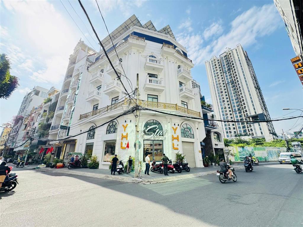 Bán lỗ giảm sâu tòa nhà góc 2mt ngay hà đô, q10  dt 12x15m, hầm 7 tầng, hđt 200 triệu, giá ...