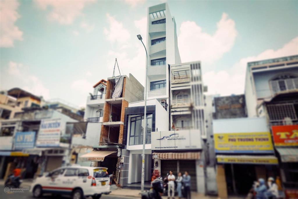 12,8 tỷ tl , bán nhà mt lạc long quân, p8, tb, 75m2 , 7 tầng thang máy