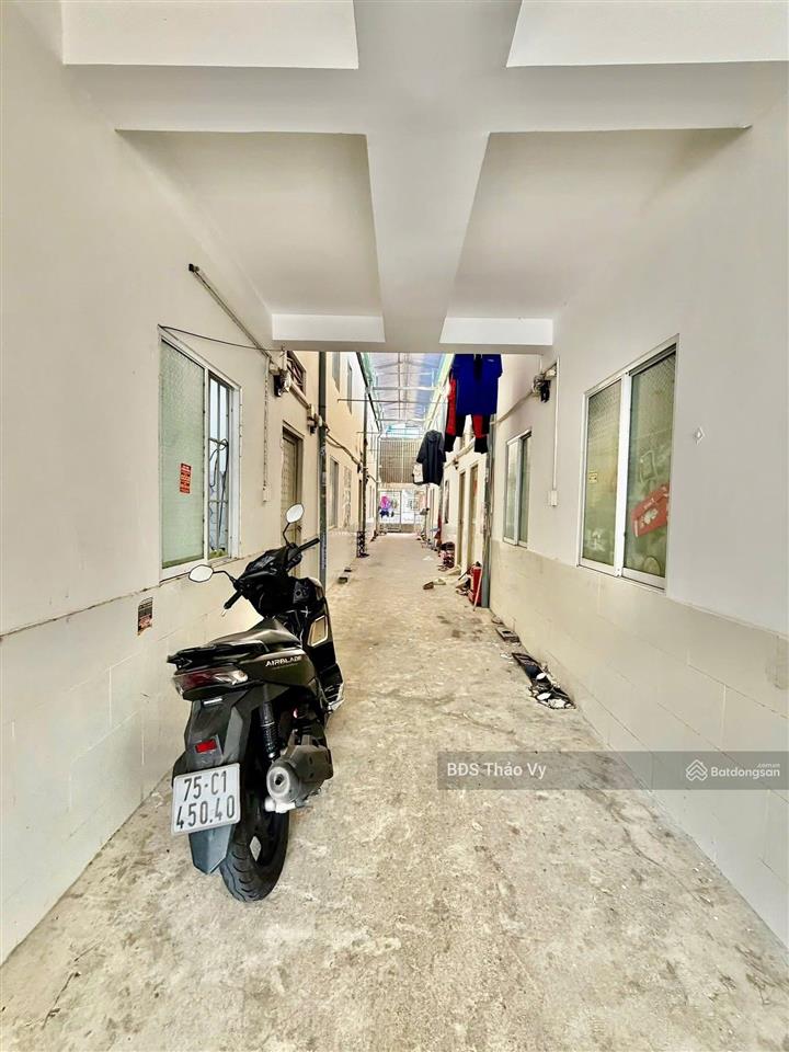 Bán dãy trọ ngay chợ đêm bàu bàng 150m2 giá 1tỷ450, dòng tiền ~7tr/th, mt đường nhựa, sổ riêng