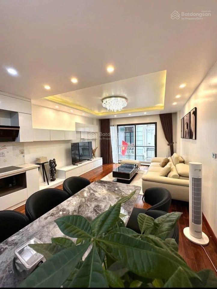 Tòa 7 tầng thang máy khúc thừa dụ, kinh doanh ô tô vào nhà, 15m ra phố, 52m2 mt 4.2m 19 tỷ