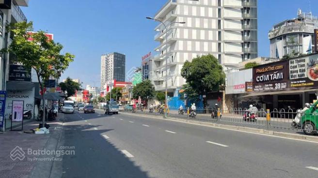 Bán nhà mặt tiền phan đăng lưu, dt 5.5x13  4 tầng, giá trong tháng 23 tỉ