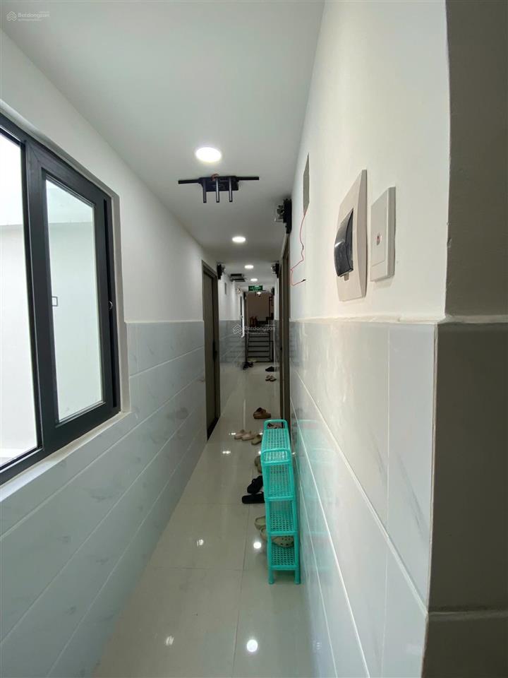 Bán nhà hoàng hoa thám, dt  8mx25m, cn  180m2, kc  hầm + 5 tầng tn  180tr/th  giá  35 tỉ.