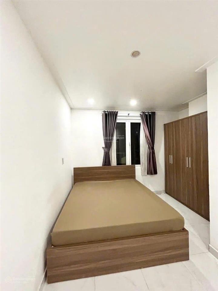Bán gấp nhà mt lê quang định, dt  7nh11x25m , cn  150m2  8 tầng  tn 130tr/tháng, giá  32 tỉ