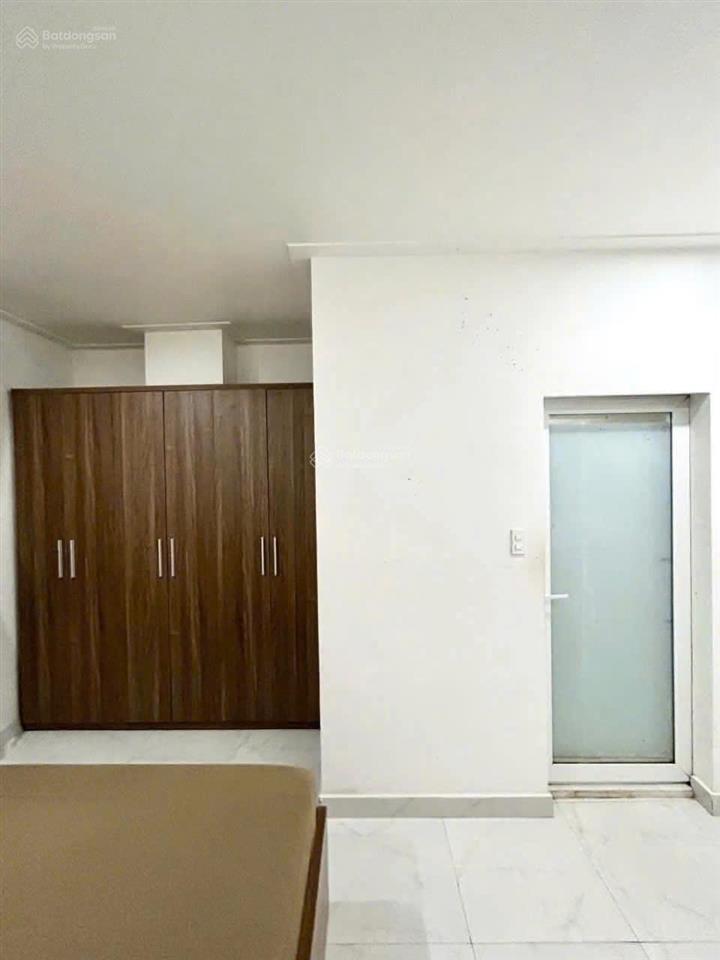 Bán gấp nhà mt lê quang định, dt  7nh11x25m , cn  150m2  8 tầng  tn 130tr/tháng, giá  32 tỉ