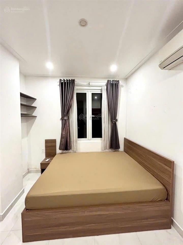 Bán gấp nhà mt lê quang định, dt  7nh11x25m , cn  150m2  8 tầng  tn 130tr/tháng, giá  32 tỉ