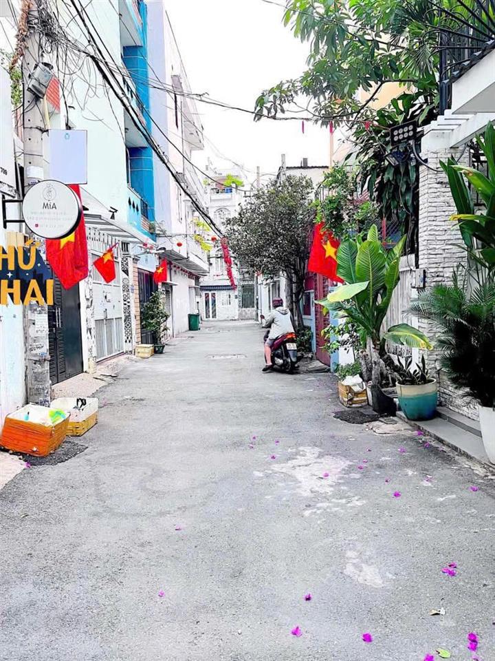 Bán nhà hxh 891/6 nguyễn kiệm p3 gò vấp, dt 5,2x20m  cn 100m2  5 tầng giá 12 tỷ cc 0909 441 ***
