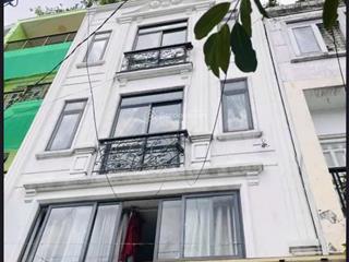 Cách 1 căn ra mặt tiền dương quảng hàm  xe hơi ngủ gọn trong nhà  đang kinh doanh 11 phòng chdv.