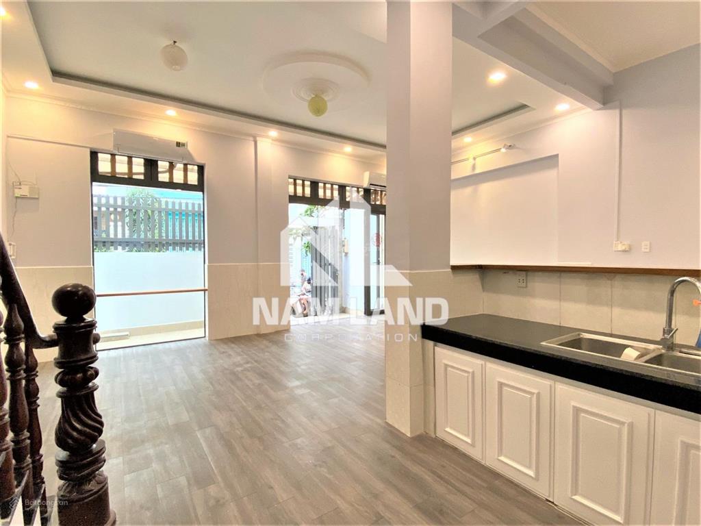 Cho thuê nhà ở kết hợp văn phòng, trệt 2 lầu, ntcb,đường thông xe tải,giá thuê 30tr