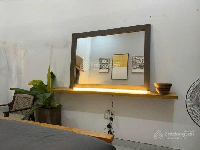 Ngộp ngân hàng 13 tỷ bán gấp ! chdv cao cấp đường đinh tiên hoàng,dt 4,5x20m, hầm+5 tầng ,hdt 90tr