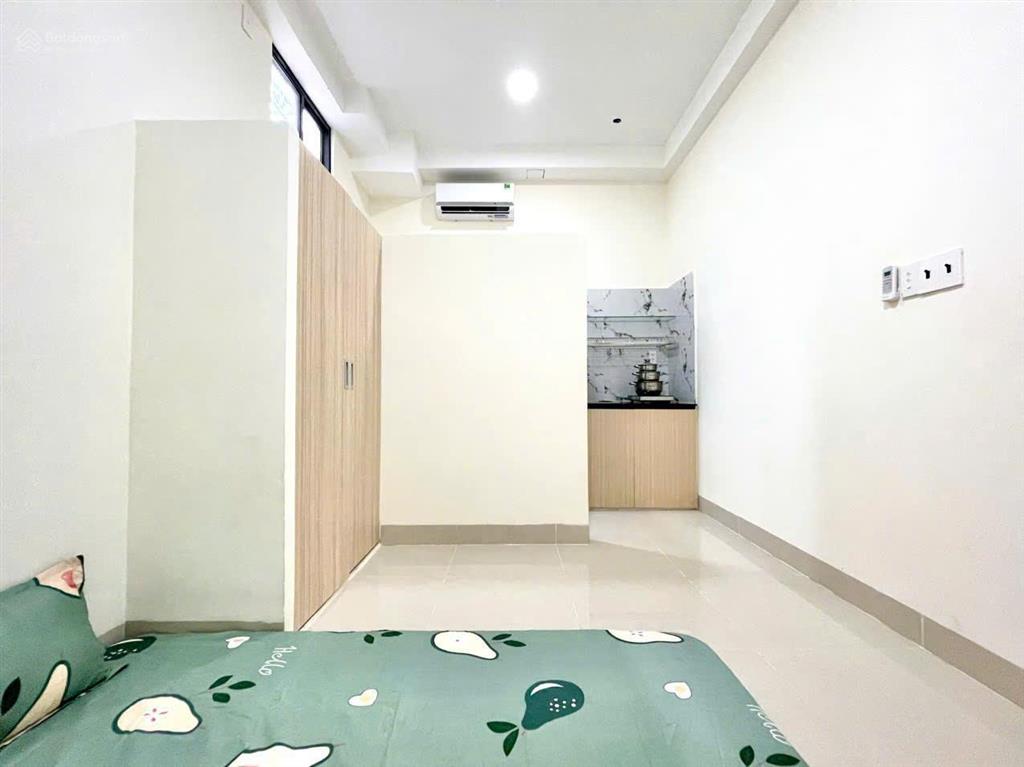 Ngộp ngân hàng 13 tỷ bán gấp ! chdv cao cấp đường phan đăng lưu,dt 4,5x20m, hầm+5 tầng ,hdt 90tr