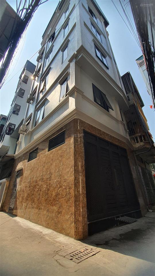 Bán nhà ngay ngã tư sở 38m2 6 tầng thang máy ô tô qua nhà lô góc thoáng sáng