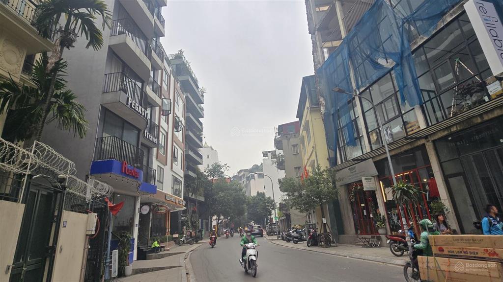 Bán nhà mặt phố tô ngọc vân, tây hồ, 7 tầng thang máy, mt 7m, dt 140m2, 5 tầng nổi 2 tầng hầm.