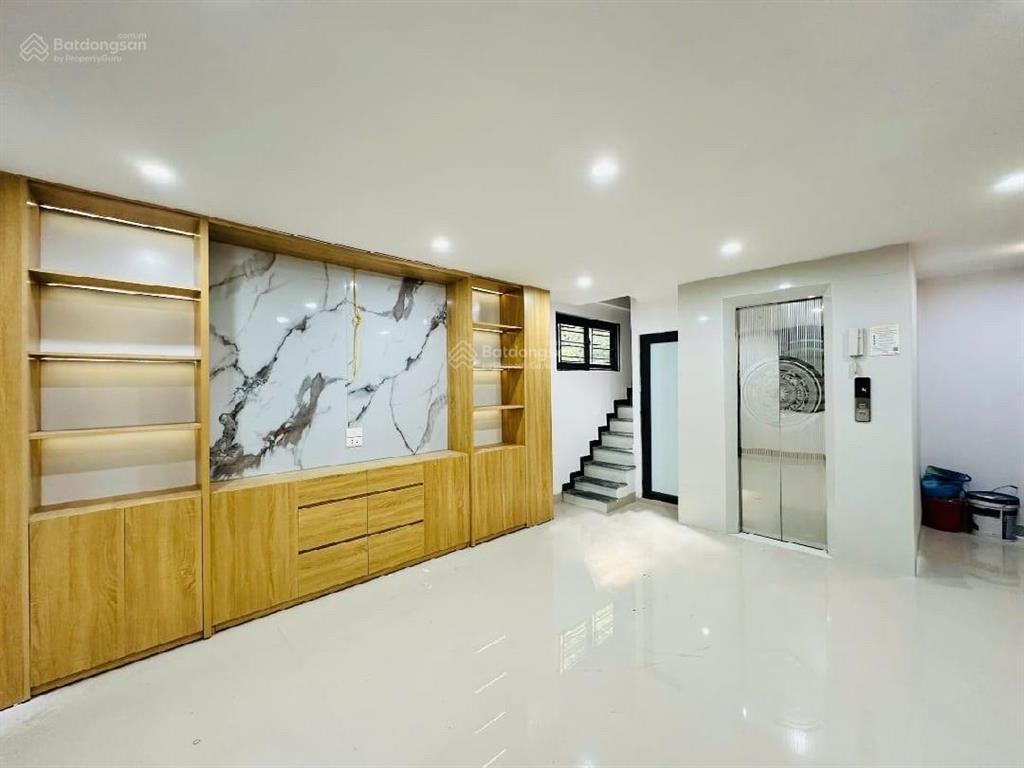 Nhà mới xây kính coong đống đa  7 tầng thang máy  2 mặt ngõ thoáng  đầu ngõ ô tô tránh siêu tiện