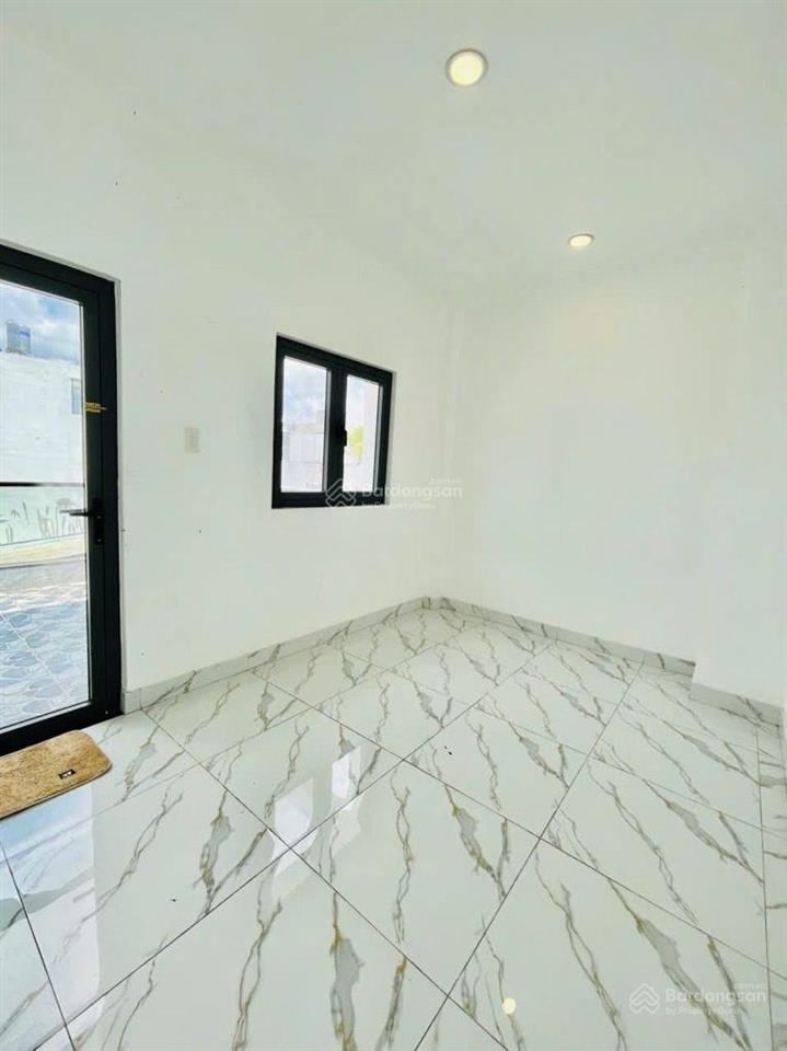 Nhà đẹp 4 tầng, dt (4x14)m2, hẻm xe hơi thông suốt, ngay ngã tư bốn xã, giá 6,85 tỷ còn tl