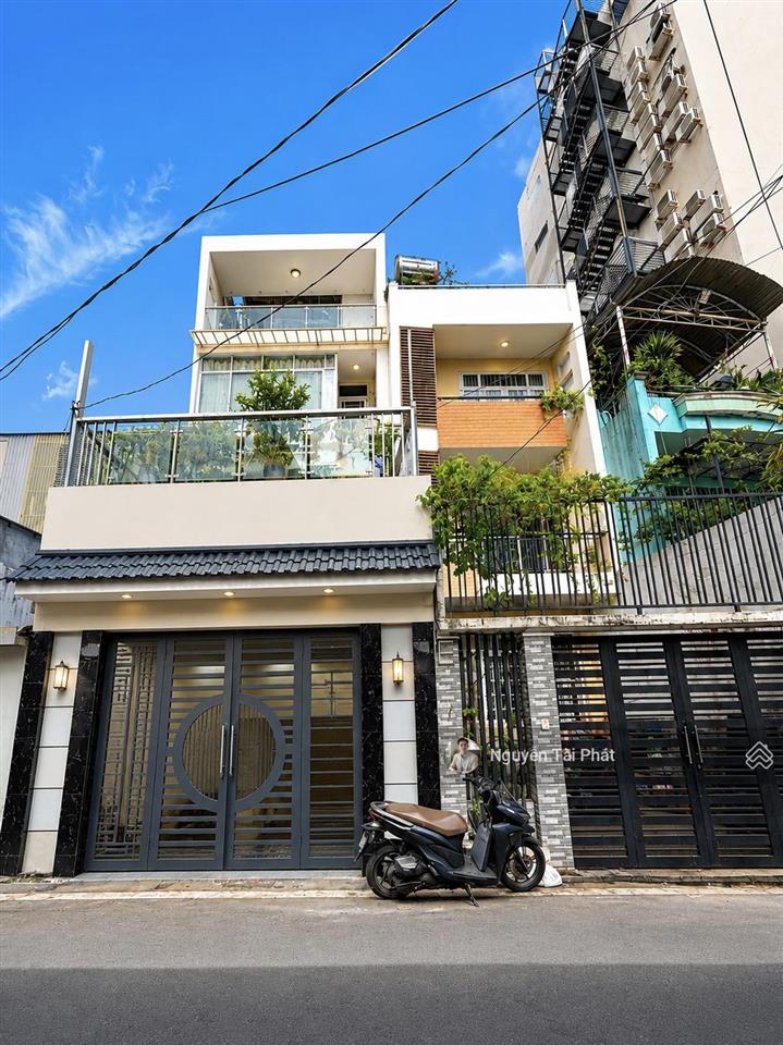 Nhà đẹp 4 tầng 65m2 ngang 5m  đường nhựa 8m thông 3pn, gara ô tô  cách chợ tân mỹ 350m  hơn 7 tỷ