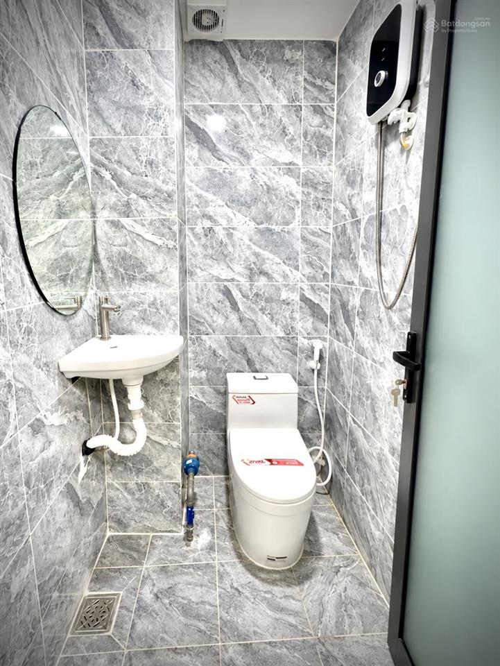 6.6 tỷ  nhà đẹp 4 tầng 64m2 làm chdv 8pn full nội thất  dòng tiền 52tr/tháng, cách chợ tân mỹ 70m