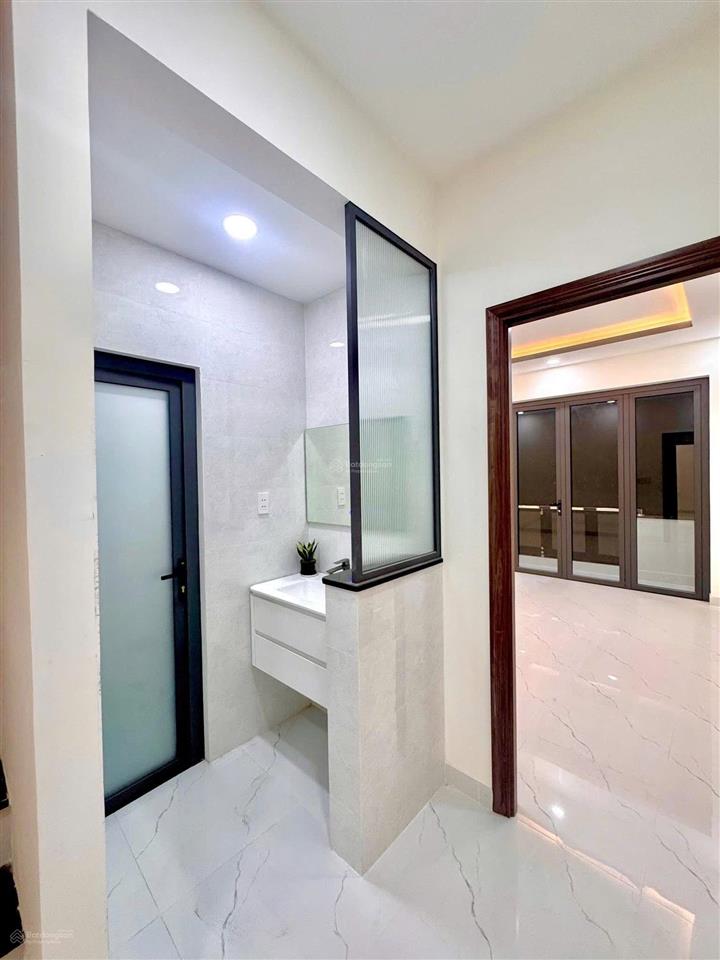 Nhà hẻm ô tô thông âu dương lân phạm thế hiển dt (4.3x14.5m), 4 tầng, mới 100%