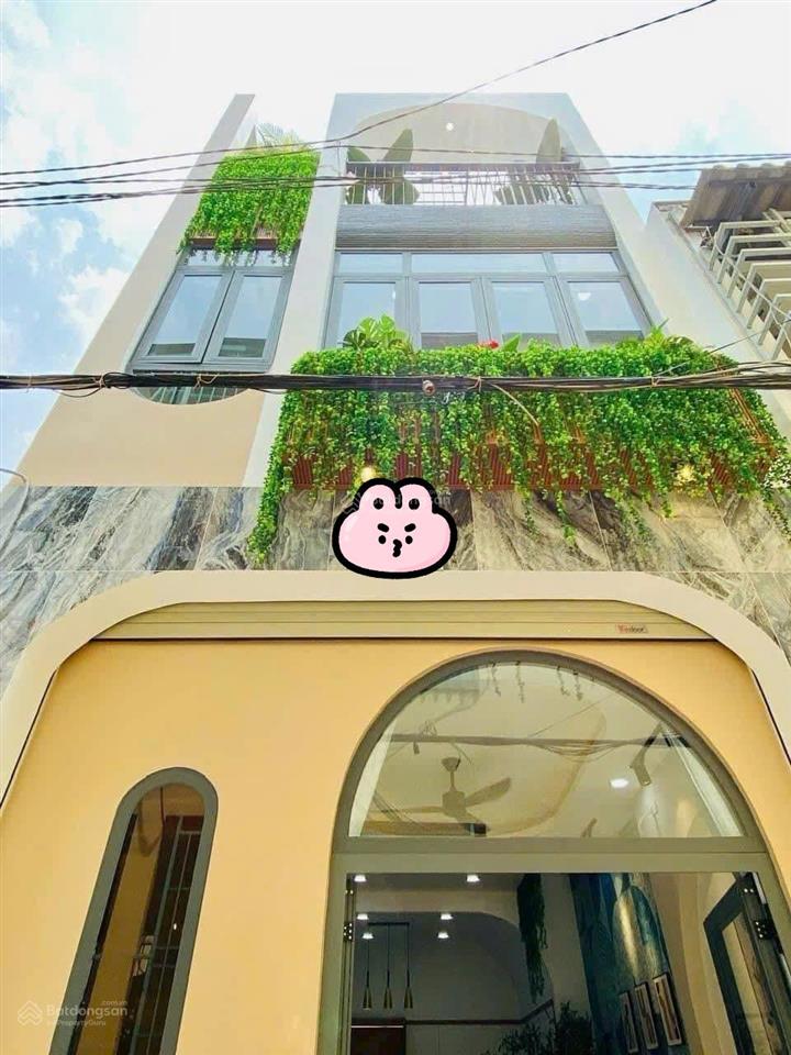 Nhà đẹp còn mới dọn vào ở ngay  tôn đản q4  49,5m2