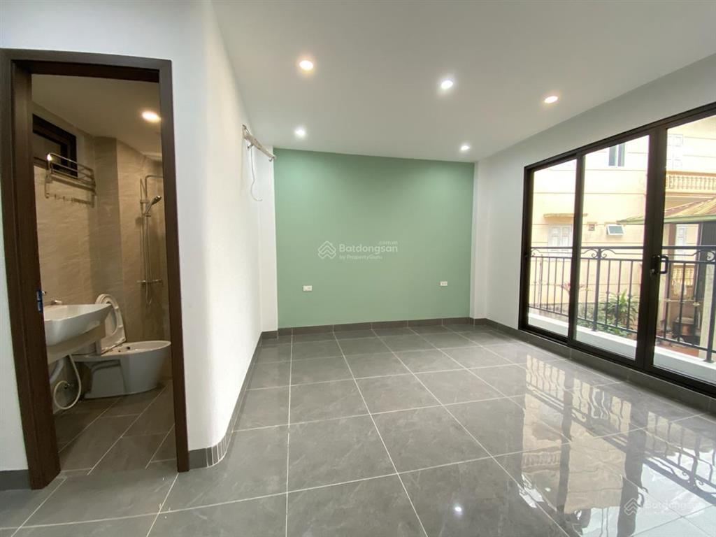 Đỗ nhuận 45m2, 7 tầng thang máy, gara ô tô, 10m ô tô tránh nhau, công viên hoà bình kế bên