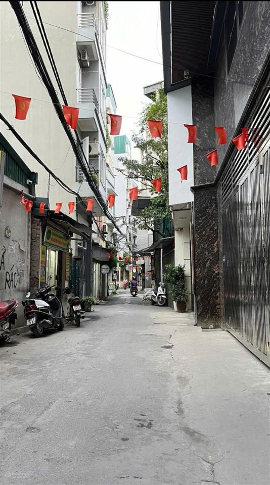 Đỗ nhuận 45m2, 7 tầng thang máy, gara ô tô, 10m ô tô tránh nhau, công viên hoà bình kế bên