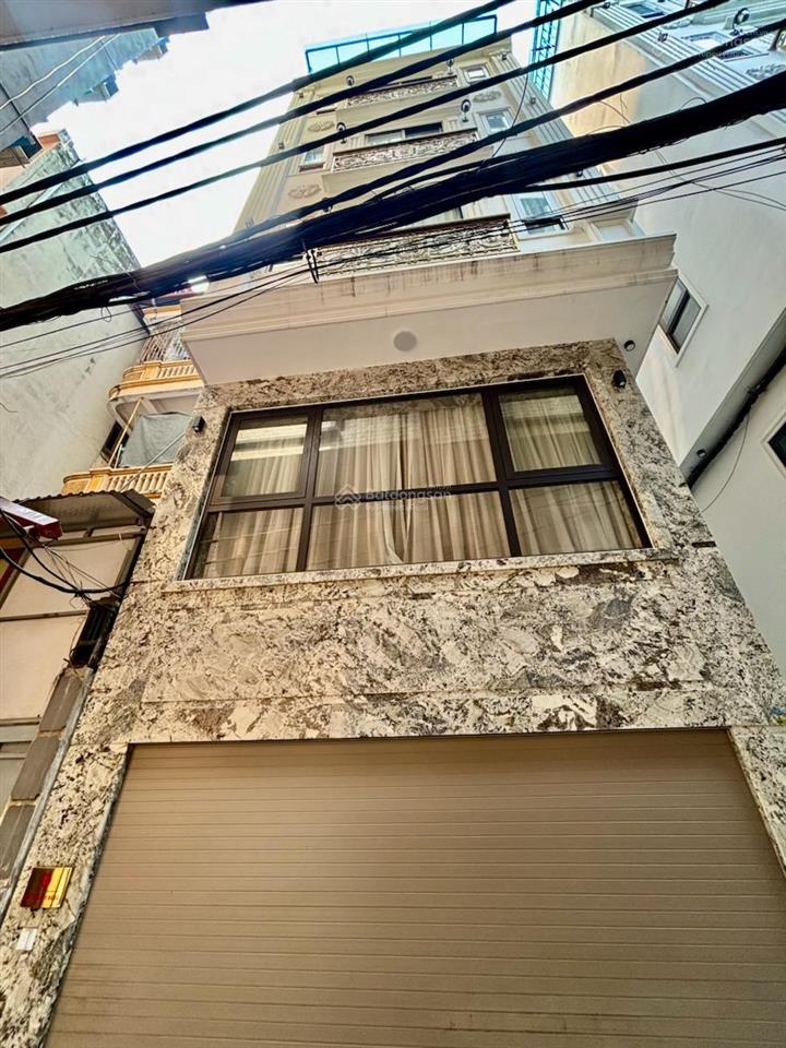 Bán nhà 1150 láng đống đa phân lô ô tô tránh 44m2, 6 tầng, mt 5m  14.5 tỷ thông sàn thang máy