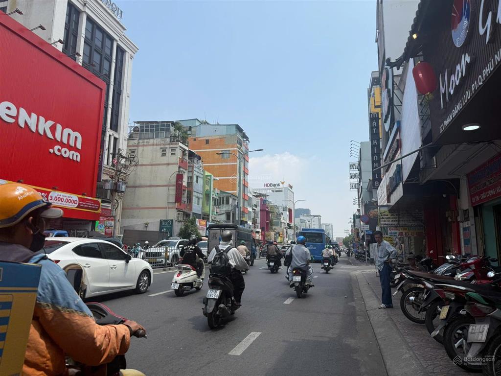 Chính chủ bán nhà mặt tiền phan đăng lưu ngay ngã tư phú nhuận, 7 tầng có thang máy dt 4x25