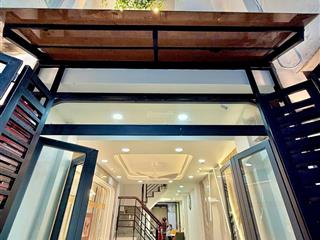 Lên sóng nhà sát mặt tiền 4 tầng khu vip phú nhuận nhà hai mặt tiền truớc sau , nguyễn trọng