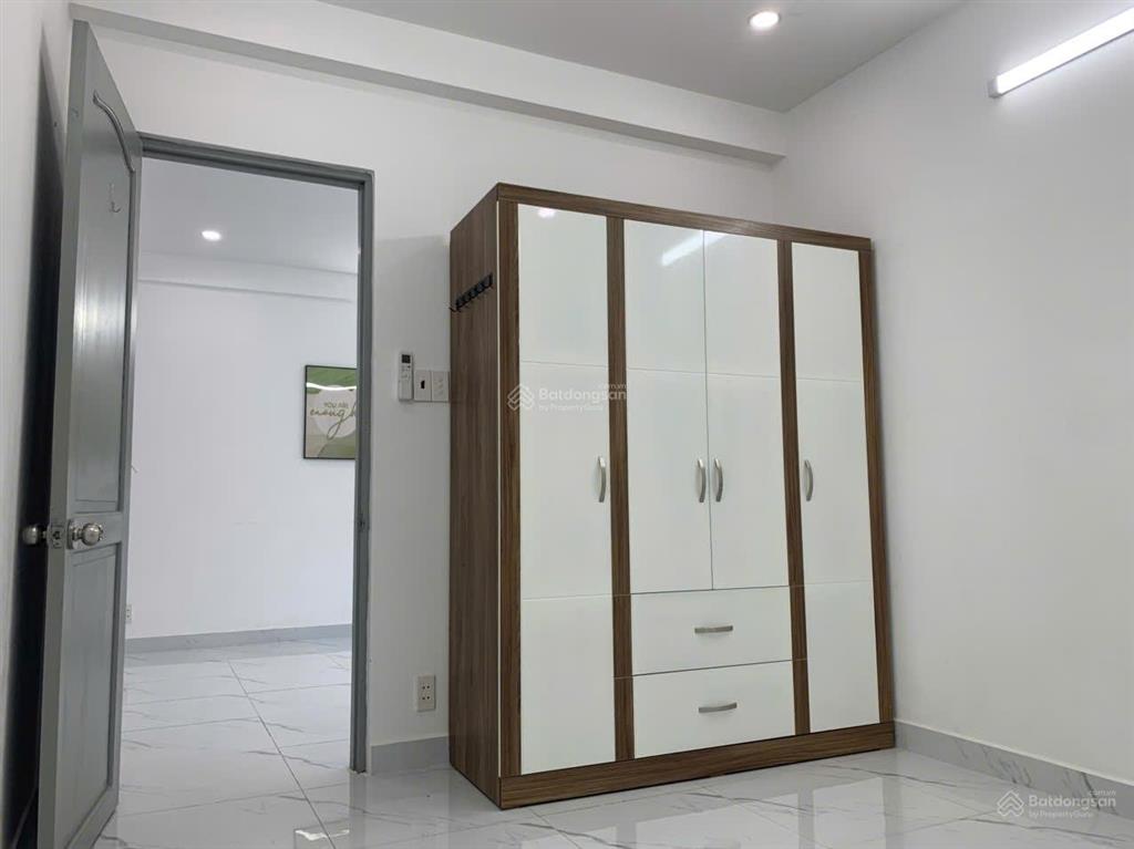 Cho thuê căn hộ 2pn, 2wc, 66m², 9tr/th chung cư 312 lạc long quân, quận 11, tp.hcm