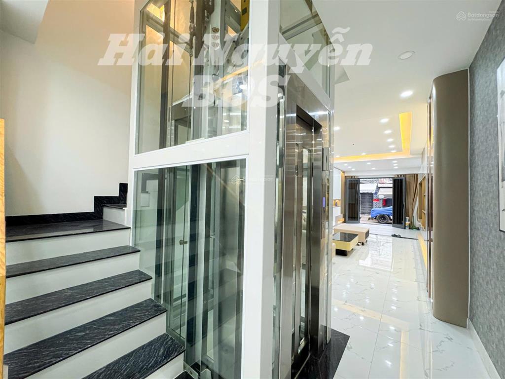 Nhà 4 tầng có thang máy, mặt tiền đường số, tân quy q7