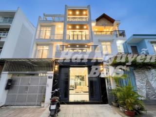 Nhà 4 tầng có thang máy, mặt tiền đường số, tân quy q7