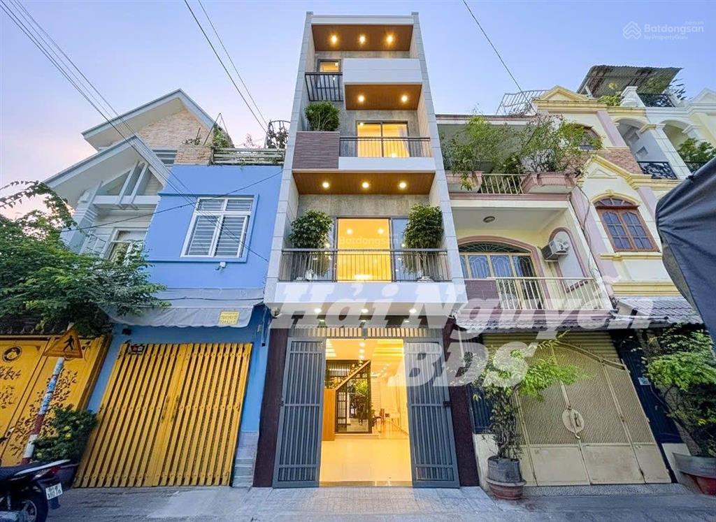 4 tầng mặt tiền đường số cư xá ngân hàng q7  có thang máy