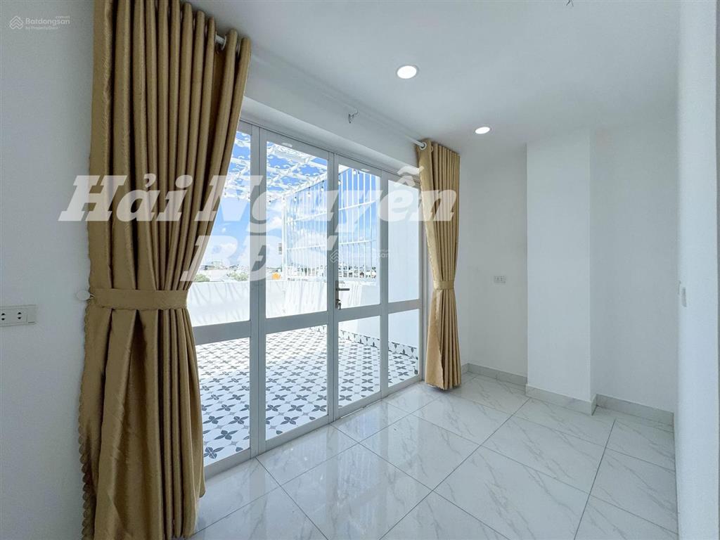Nhà 4 tầng mặt tiền kinh doanh hẻm xe hơi huỳnh tấn phát. 4m x 16m  8 tỷ 900
