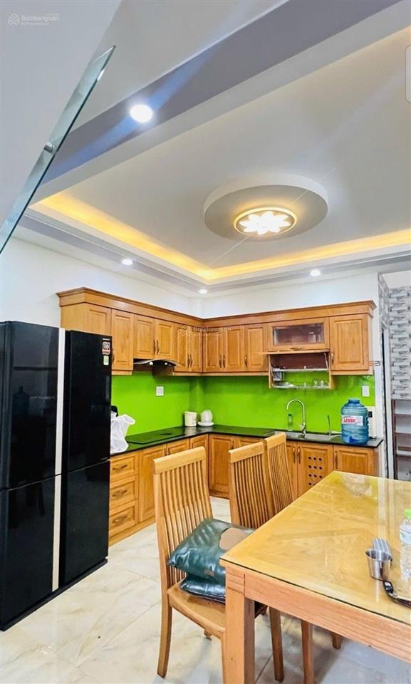 Chủ gấp bán nhà đẹp tân chánh hiệp  4 tầng  đường 7m  shr  full nội thất  gần hiệp thành city