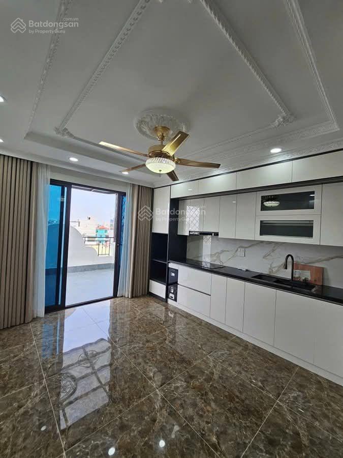 Nguyễn lam sài đồng 48m2 6 tầng thang máy gara 7 chỗ ngõ thông  nhà đẹp