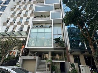 Bán nhà phố giảng võ  ba đình 10 tầng, mặt tiền 11m, sổ vuông. giá đầu tư