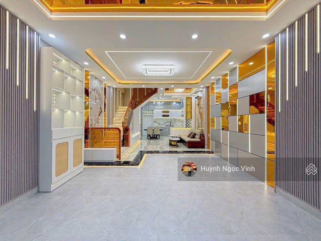 Nhà đường 8m gò ô môi sát phú mỹ hưng, 5x12m, 3 tầng full nội thất có gara ô tô, giá 9,899 tỷ