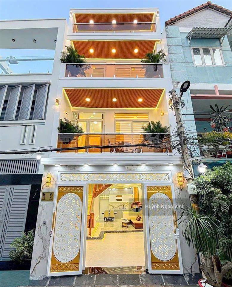 Nhà đường 8m gò ô môi sát phú mỹ hưng, 5x12m, 3 tầng full nội thất có gara ô tô, giá 9,899 tỷ