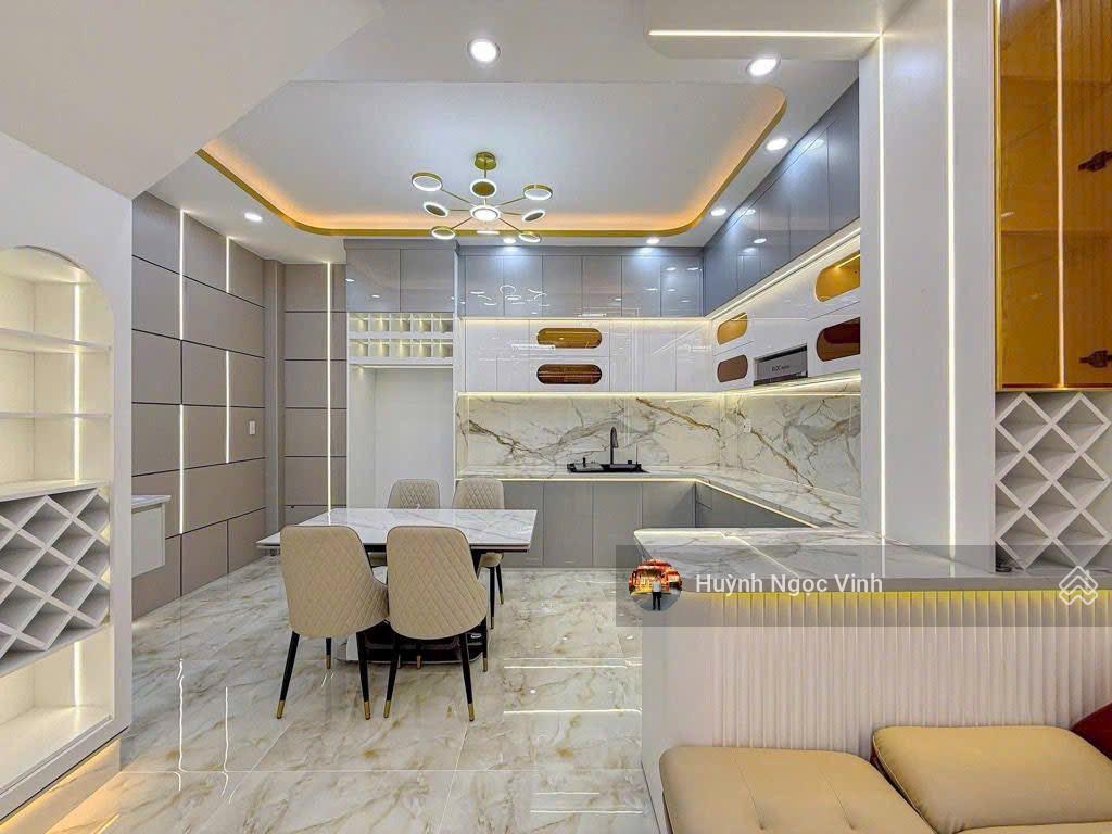 Nhà đường 8m gò ô môi sát phú mỹ hưng, 5x12m, 3 tầng full nội thất có gara ô tô, giá 9,899 tỷ