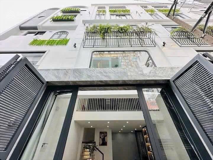 Bán nhà thích quảng đức phú nhuận hẻm 4m sổ đỏ xây kiên cố cho thuê hay ở đều được