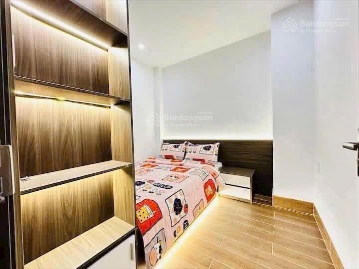 Bán nhà thích quảng đức phú nhuận hẻm 4m sổ đỏ xây kiên cố cho thuê hay ở đều được